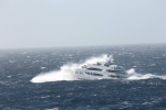 The yacht was designed to function not just as a floating palace but as a seagoing vessel--and as it crossed the Atlantic a few weeks ago, it was clobbered by a violent storm. These photos were taken by a passing freighter.  Photo: ©Patty Witler Anderson.
