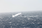 The yacht was designed to function not just as a floating palace but as a seagoing vessel--and as it crossed the Atlantic a few weeks ago, it was clobbered by a violent storm. These photos were taken by a passing freighter.  Photo: ©Patty Witler Anderson.