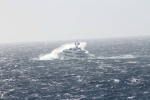 The yacht was designed to function not just as a floating palace but as a seagoing vessel--and as it crossed the Atlantic a few weeks ago, it was clobbered by a violent storm. These photos were taken by a passing freighter.  Photo: ©Patty Witler Anderson.