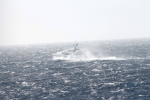 The yacht was designed to function not just as a floating palace but as a seagoing vessel--and as it crossed the Atlantic a few weeks ago, it was clobbered by a violent storm. These photos were taken by a passing freighter.  Photo: ©Patty Witler Anderson.