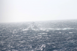 The yacht was designed to function not just as a floating palace but as a seagoing vessel--and as it crossed the Atlantic a few weeks ago, it was clobbered by a violent storm. These photos were taken by a passing freighter.  Photo: ©Patty Witler Anderson.